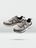 Light gray men's trekking shoes on a gray background