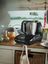 SILVERCREST Monsieur Cuisine on a camper van counter, with jars and kitchen items beside it.