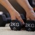 Close-up of CRIVIT dumbbells weighing 2 kg.