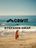 Teaser image of a 20 seconds spot of campaign video. Stefanie Graf is standing with an orange sorf board at the beach, looking at the waves.