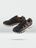 Multicoloured women's trekking shoes against a grey background
