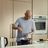 Andre Agassi cooking vegetables in a SILVERCREST frying pan.